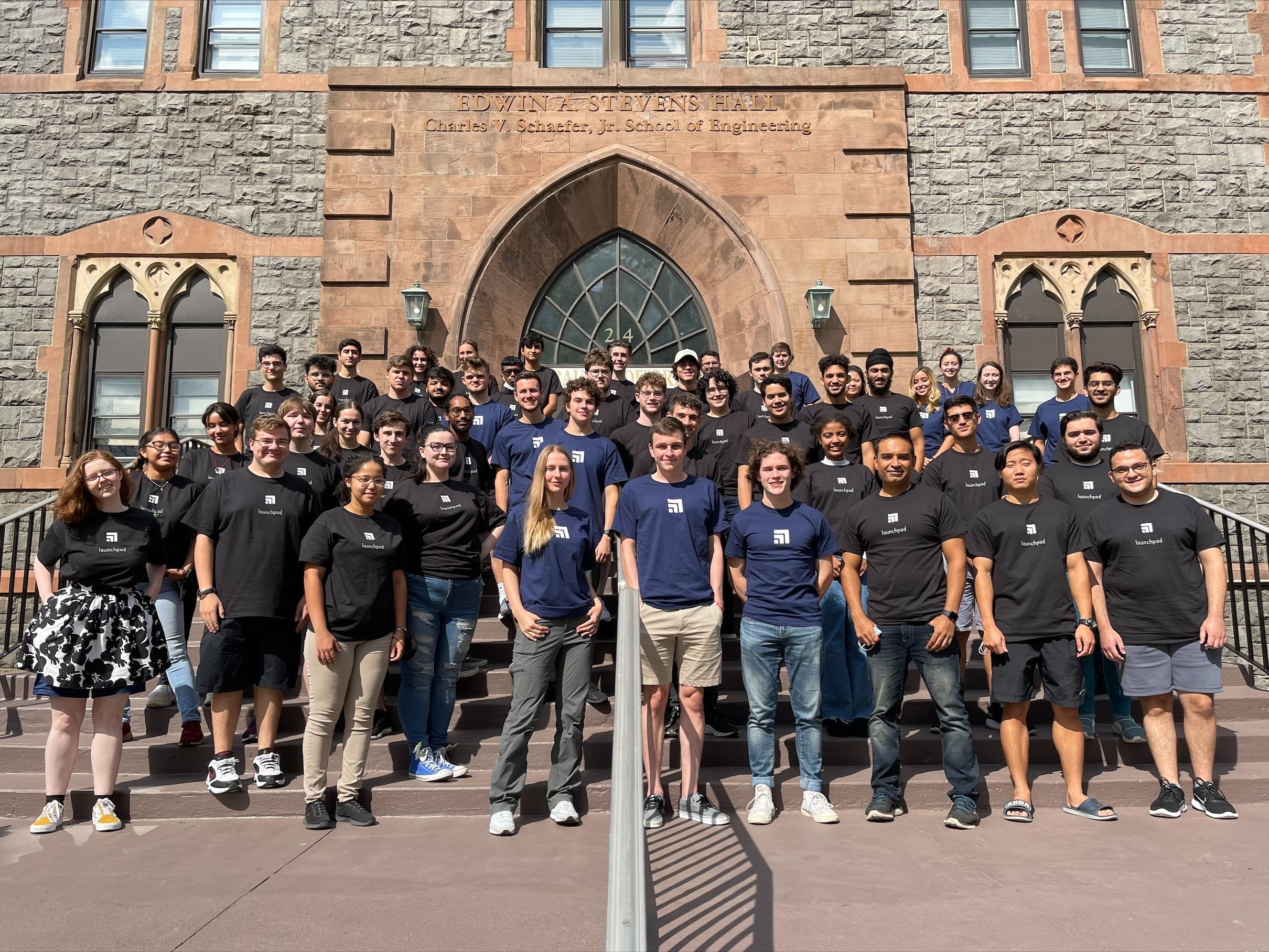 Large group of students in front of Stevens building