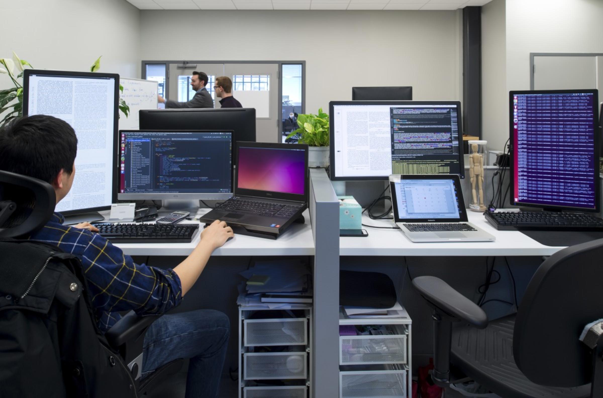 Professor Brendan Englot and Ph.D. students work on a project in the ABS lab