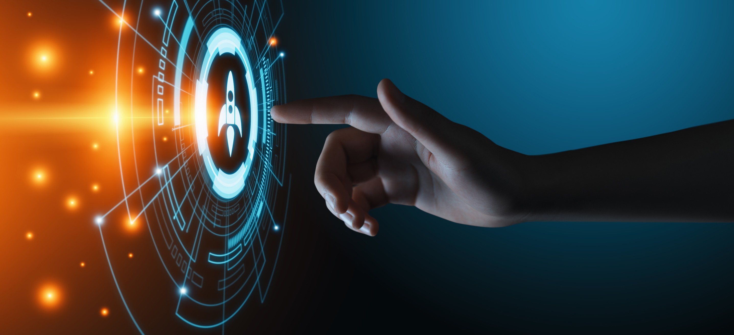 finger touching button with rocket ship on it