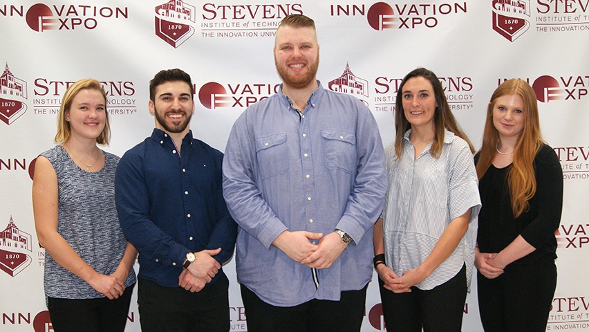 The five students who worked on the data analysis project for Thomson Reuters.