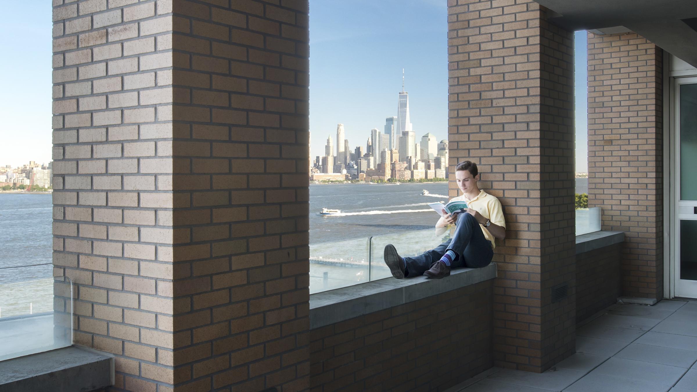 Student studying on rooftop