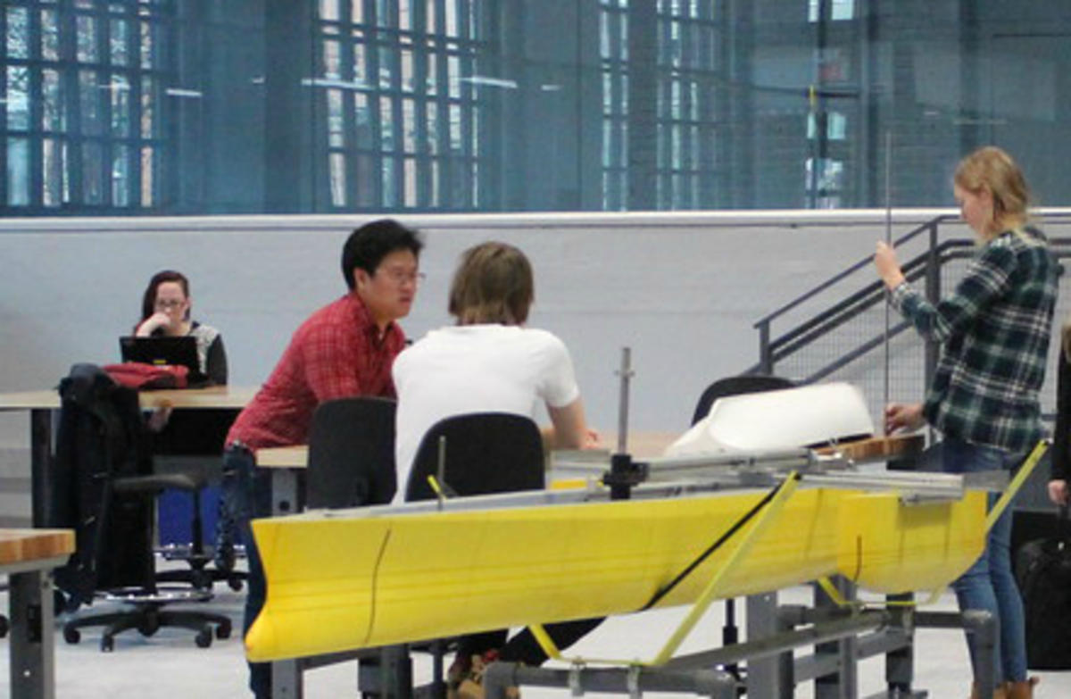 Students building a boat hull in the ABS lab