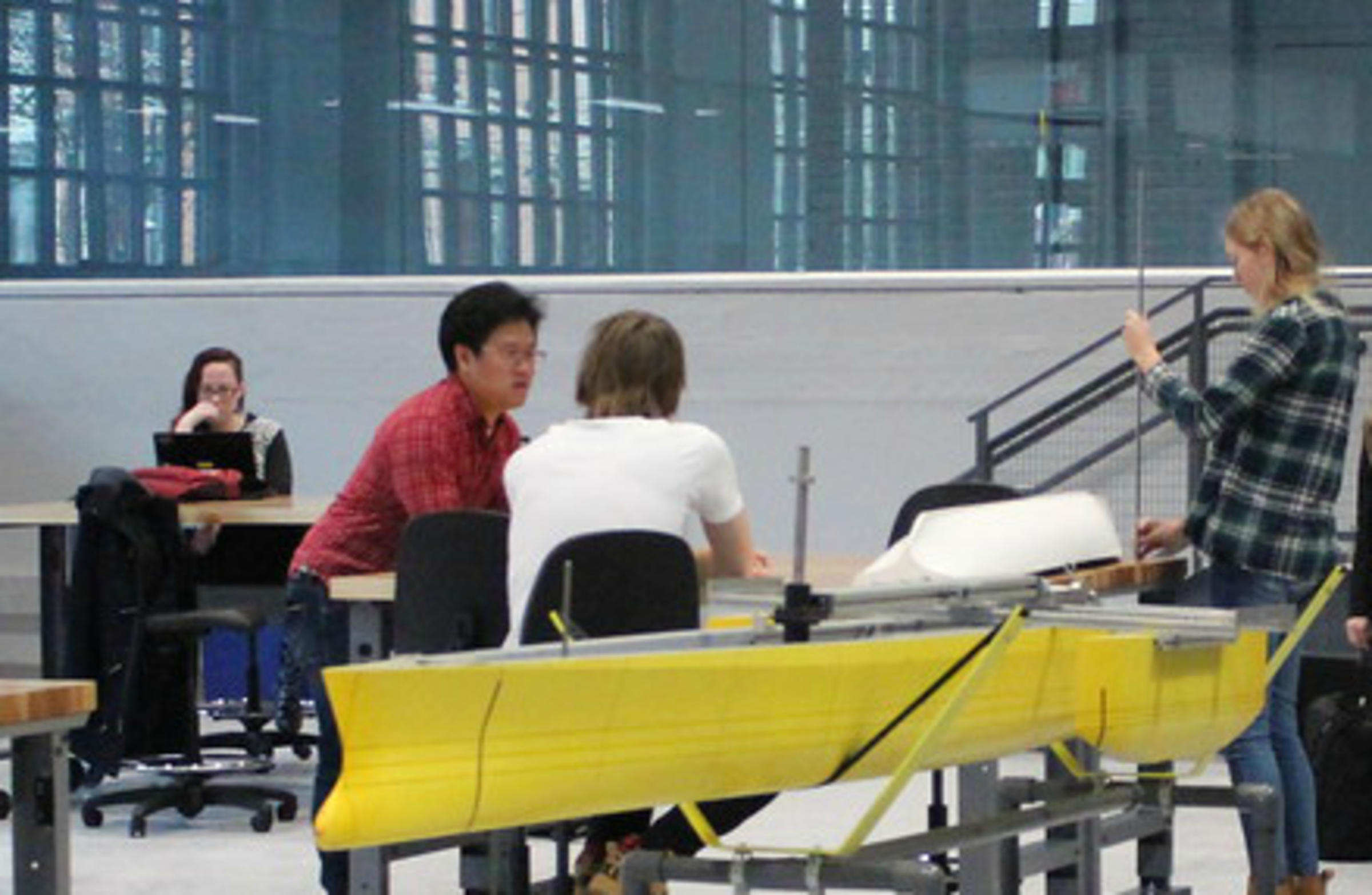 Students building a boat hull in the ABS lab