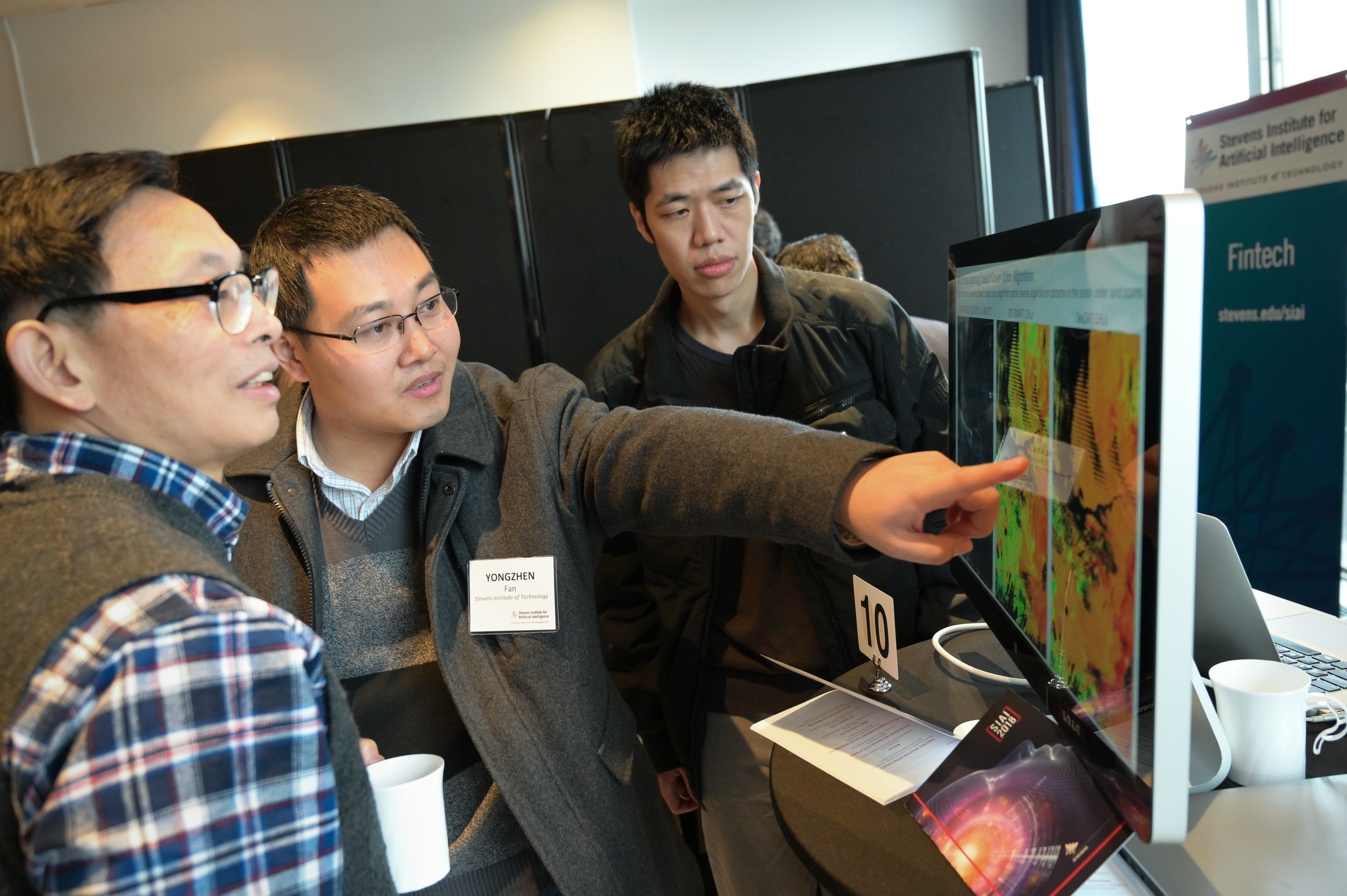 A Stevens Ph.D. student explains his ai-driven research at the Stevens Institute for Artificial Intelligence launch event