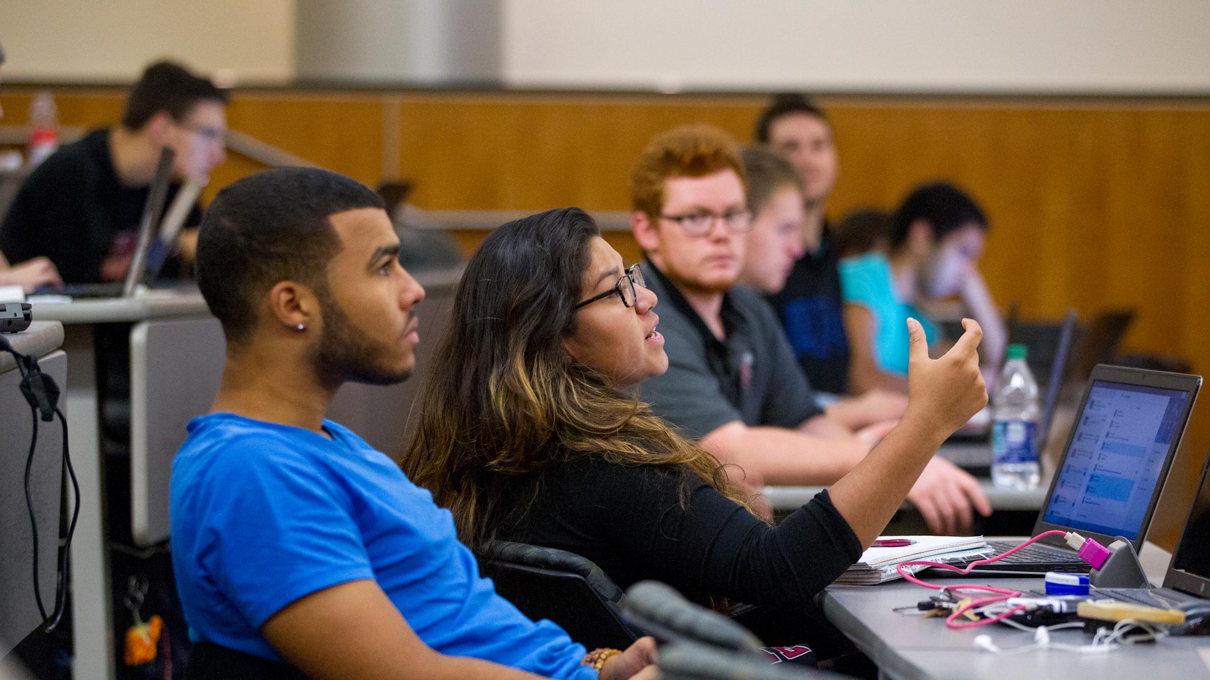students sitting at table