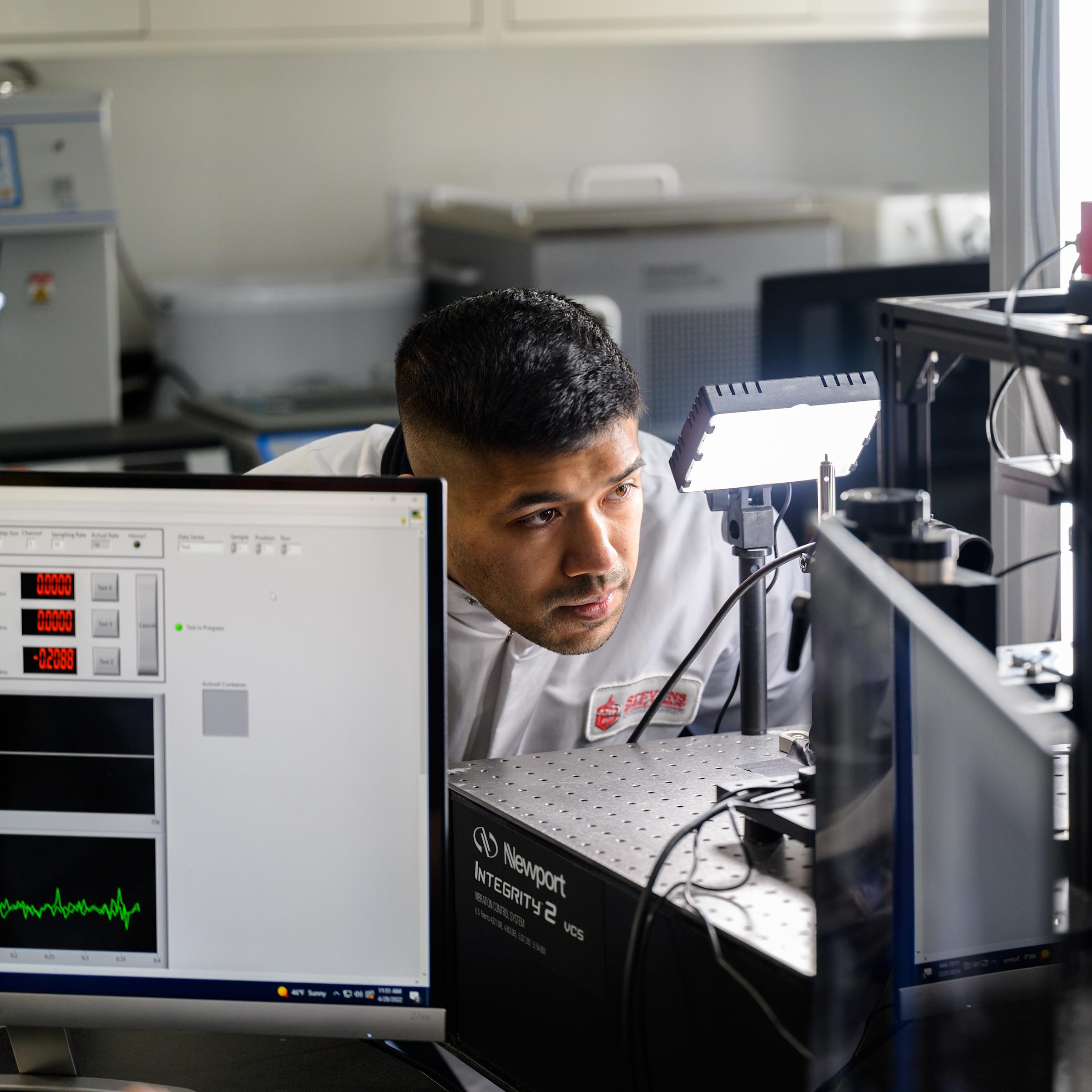 Student conducts research in a lab