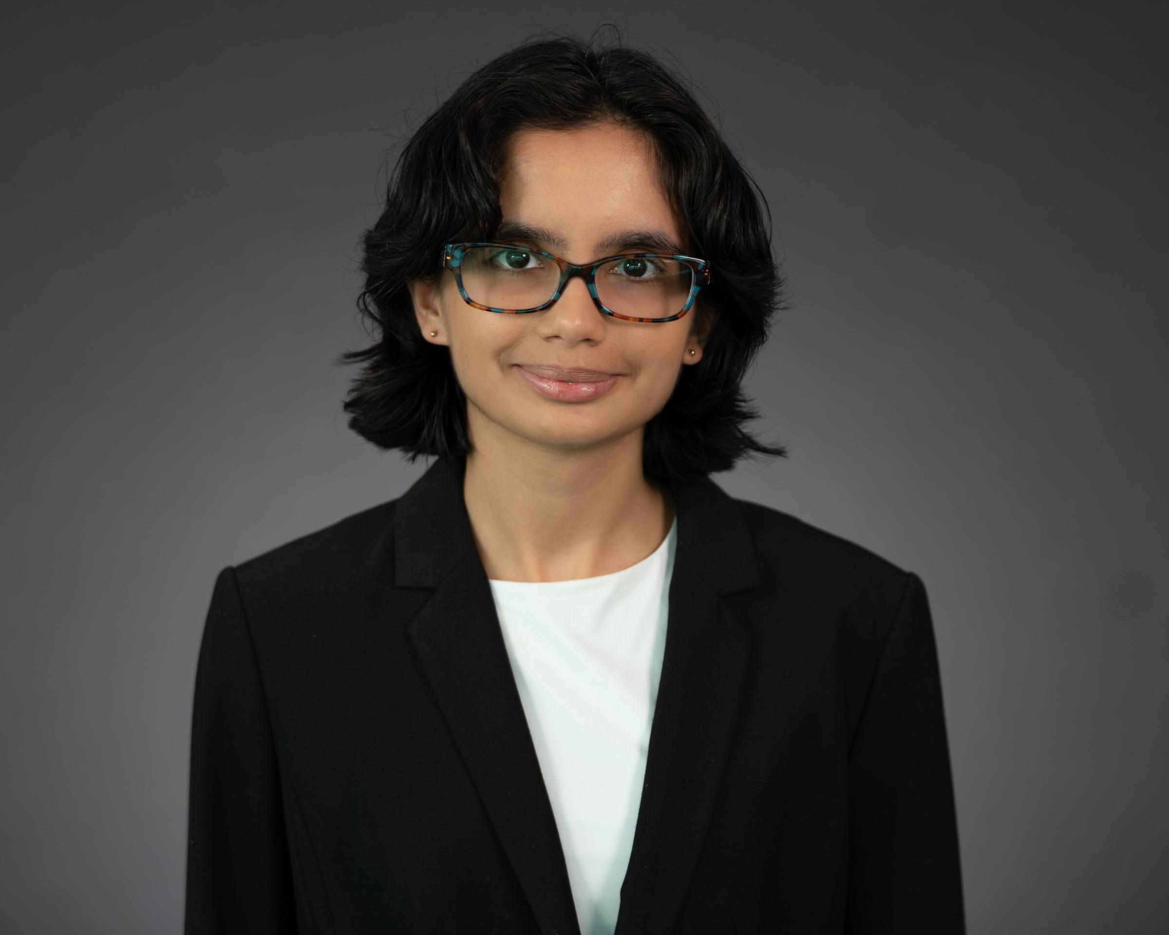 Headshot of Tasha Khosla wearing professional attire.