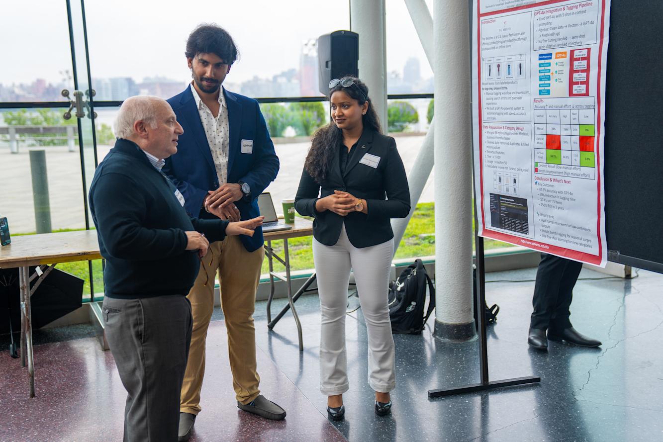 Professor Frank speaking with students
