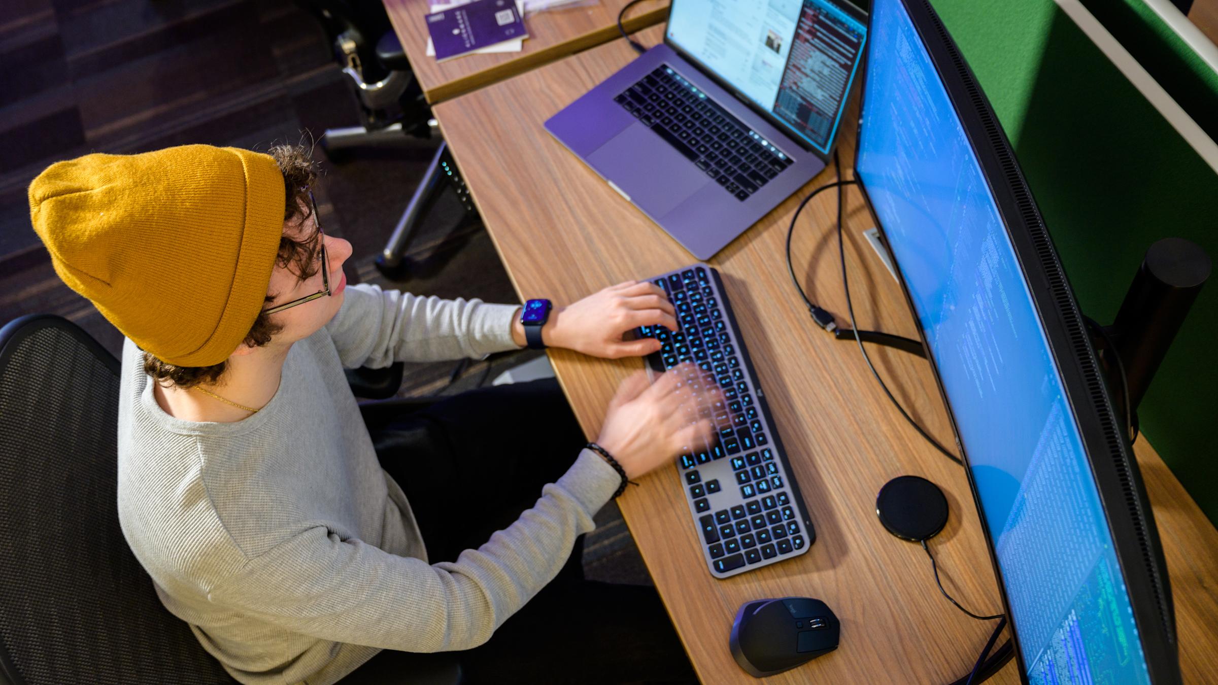 Male student working on a computer
