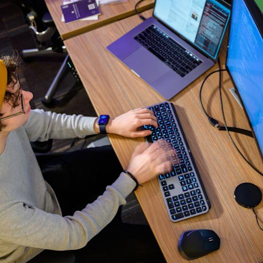 Male student working on a computer