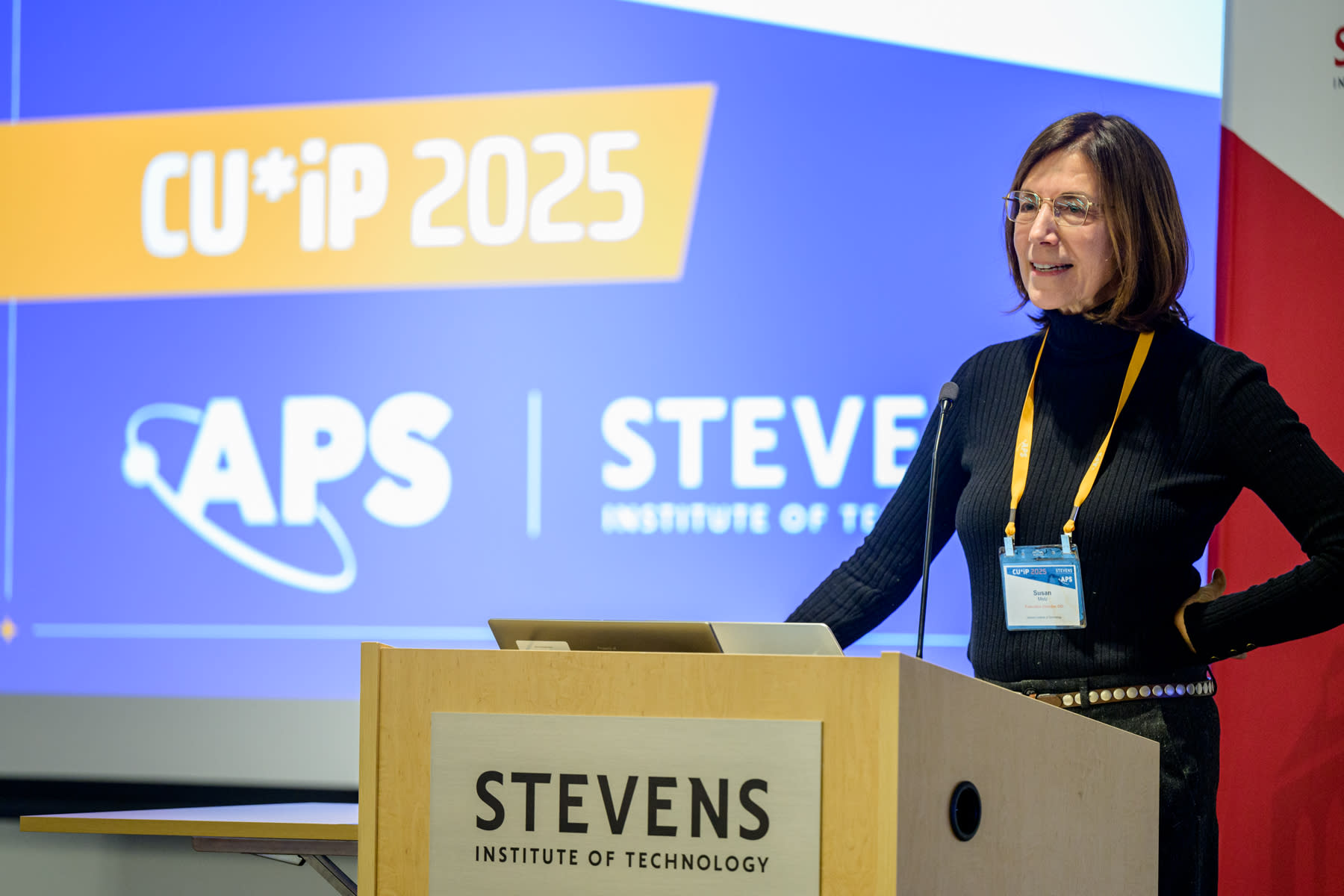 Susan Metz speaks at the podium at the 2025 CUWIP.