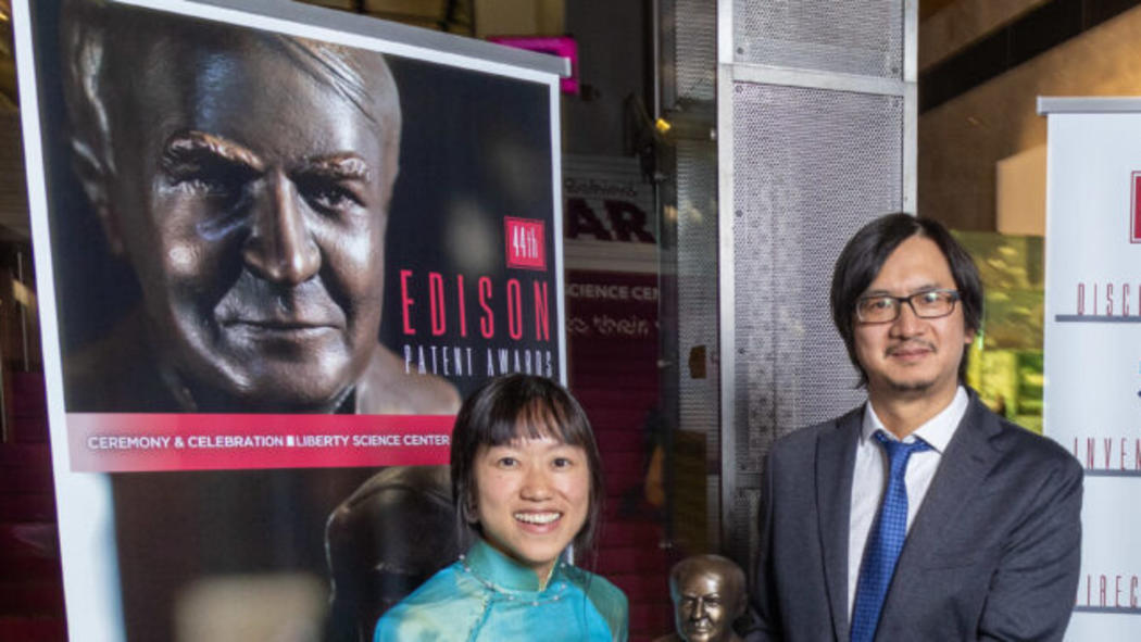Stevens professor and alumna receiving Edison Patent Award at ceremony