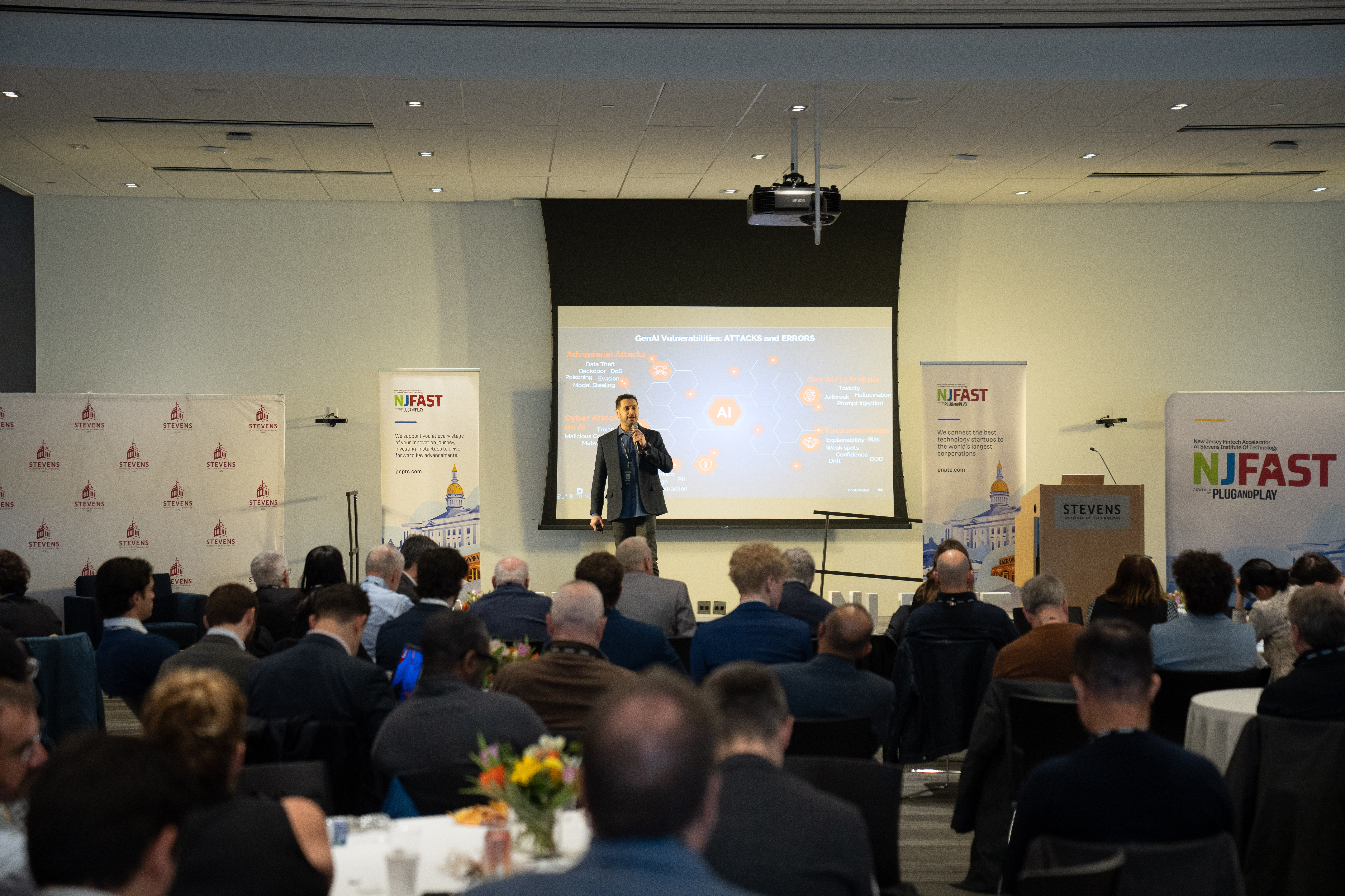 Deepkeep presents their startup to an audience of partners and spectators during an event. 