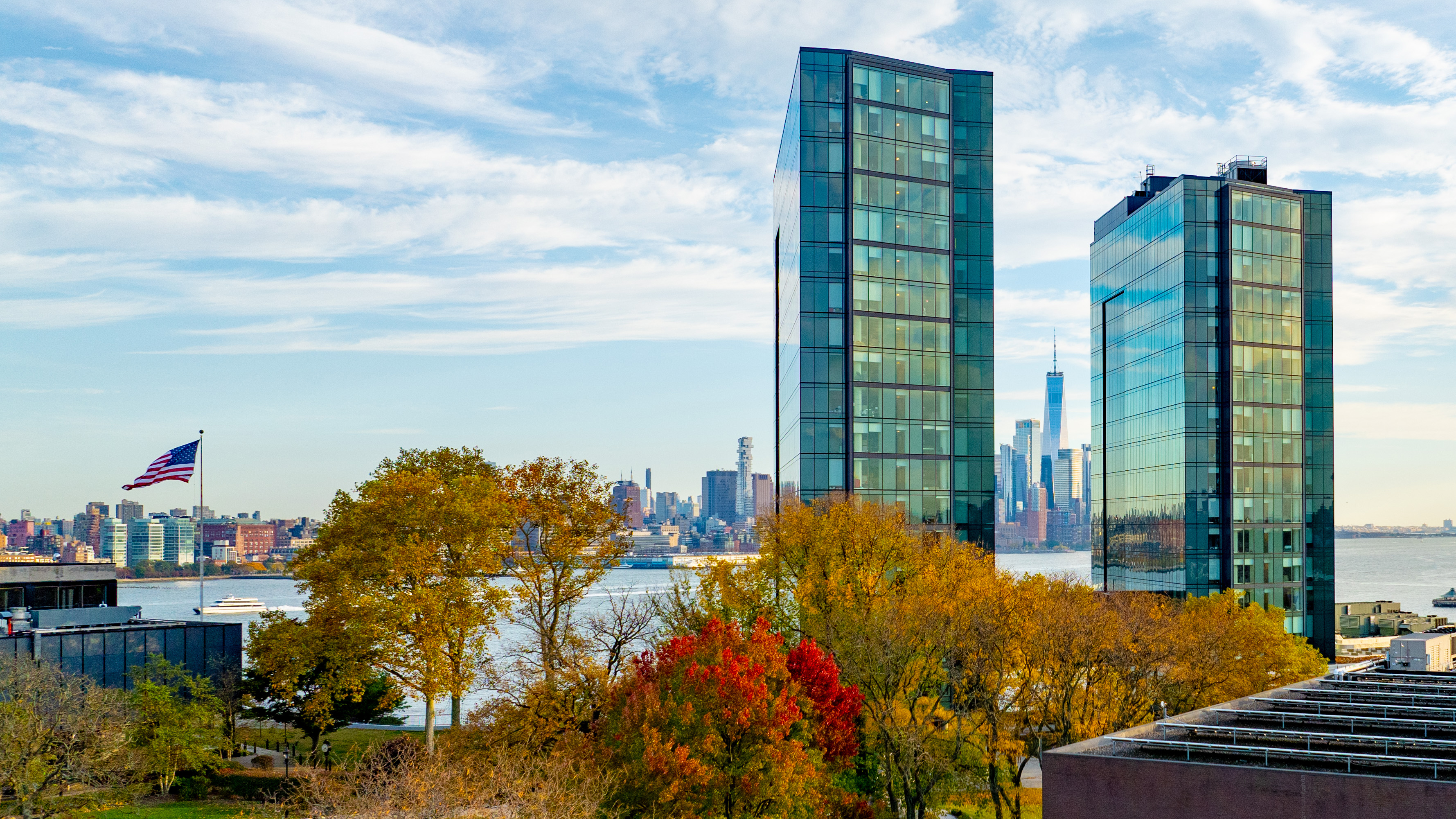 View of Campus from above, with New York skyline in background.