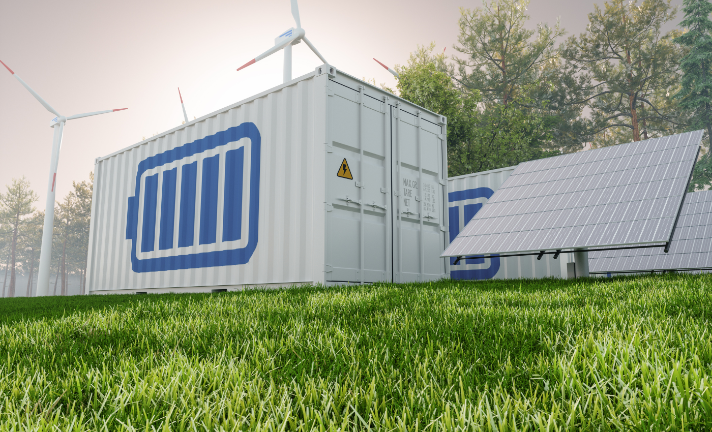 Lithium-ion battery container outdoors next to wind turbines and solar panels.