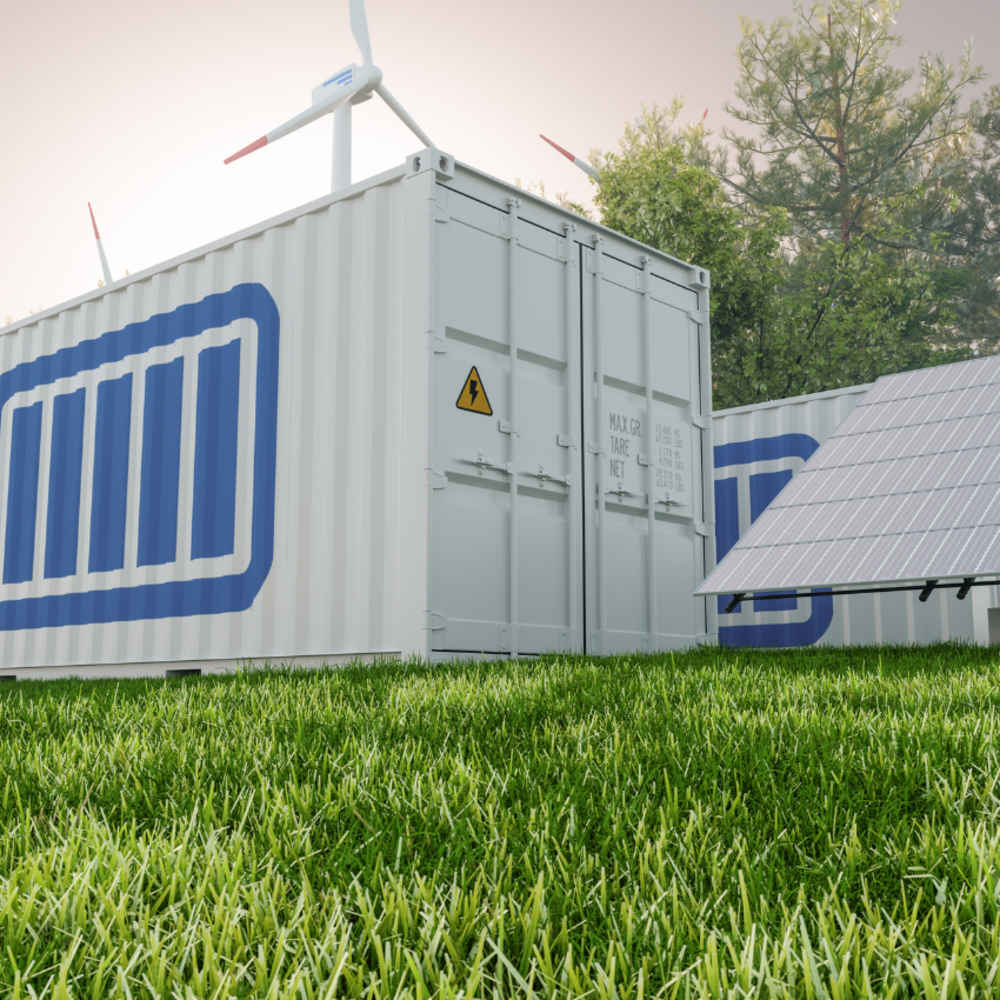 Lithium-ion battery container outdoors next to wind turbines and solar panels.