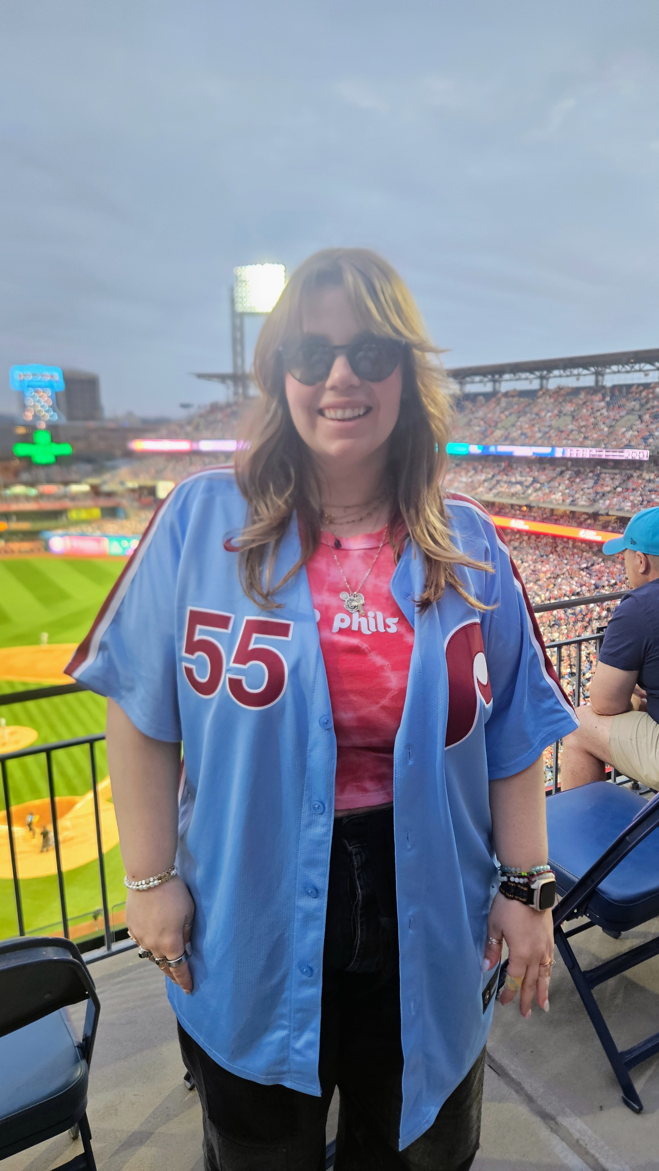 Brianna Sandone ’16 in Phillies jersey at the baseball stadium
