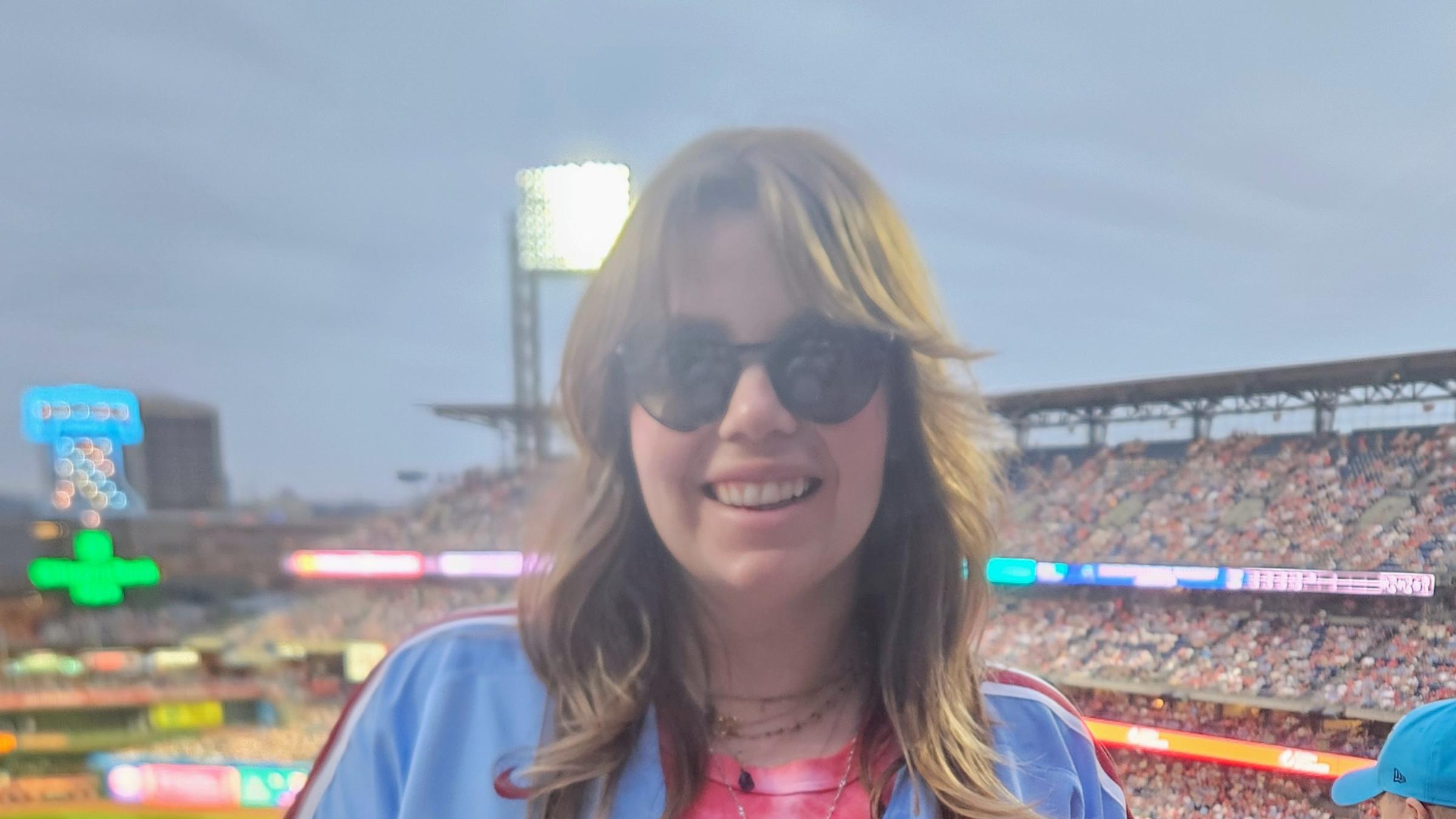 Brianna Sandone ’16 in Phillies jersey at the baseball stadium