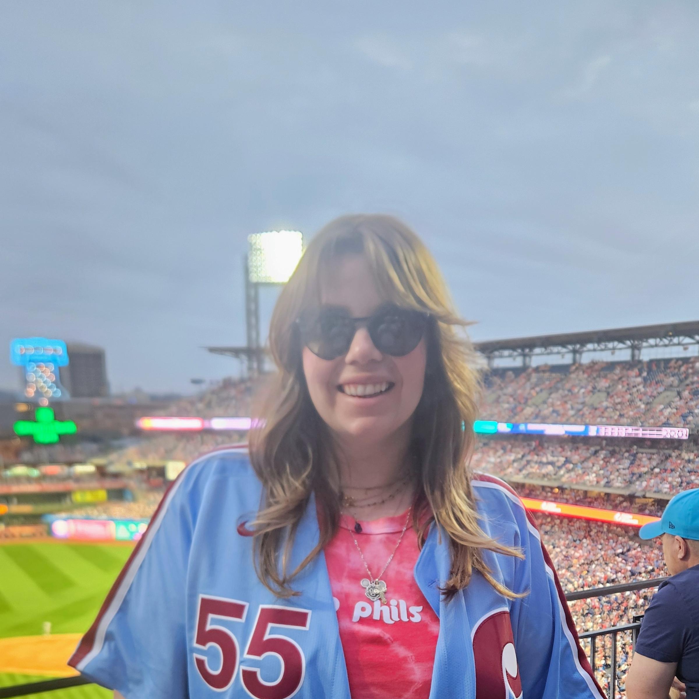 Brianna Sandone ’16 in Phillies jersey at the baseball stadium