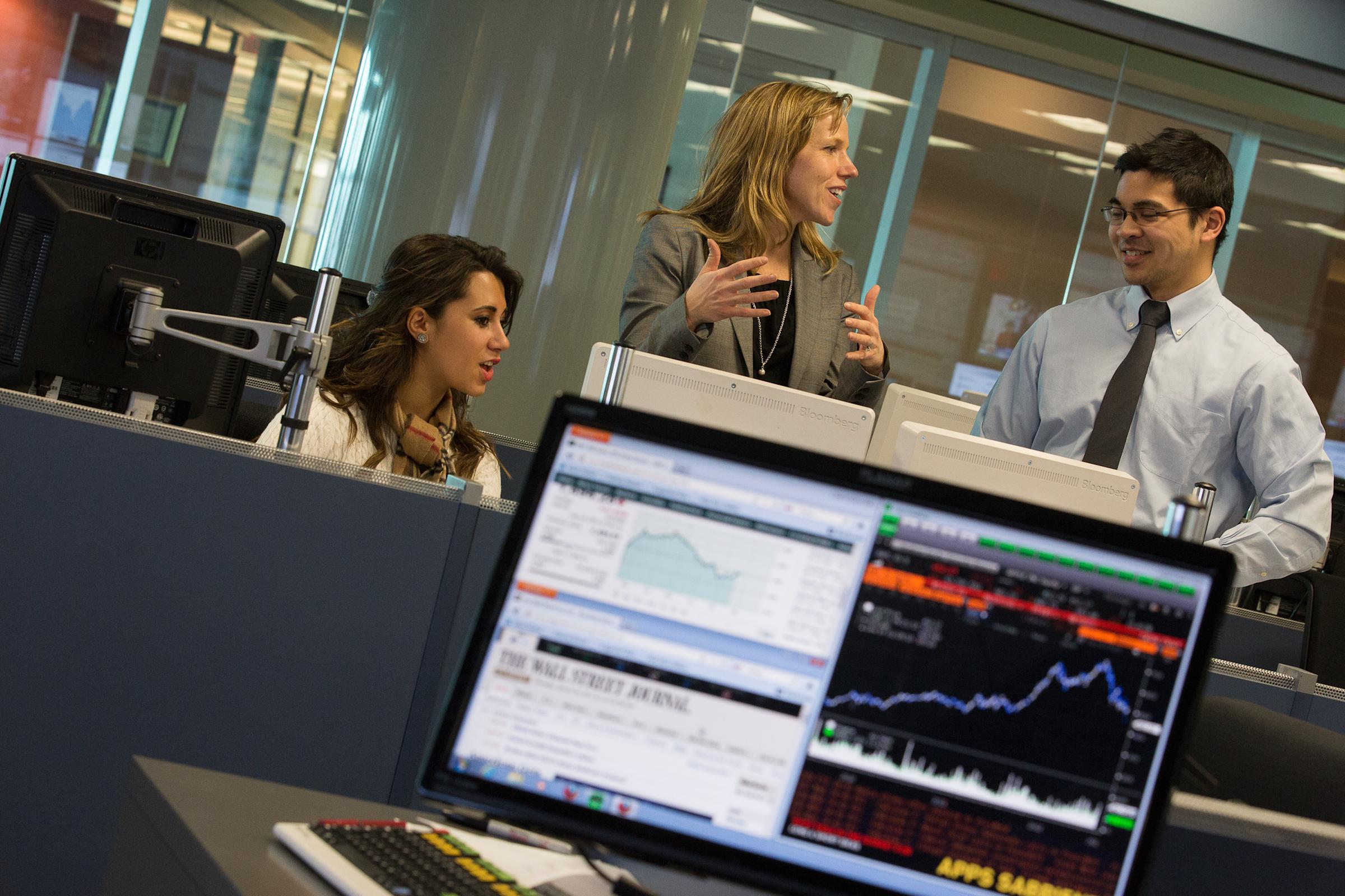 Image of individuals in a computer research lab