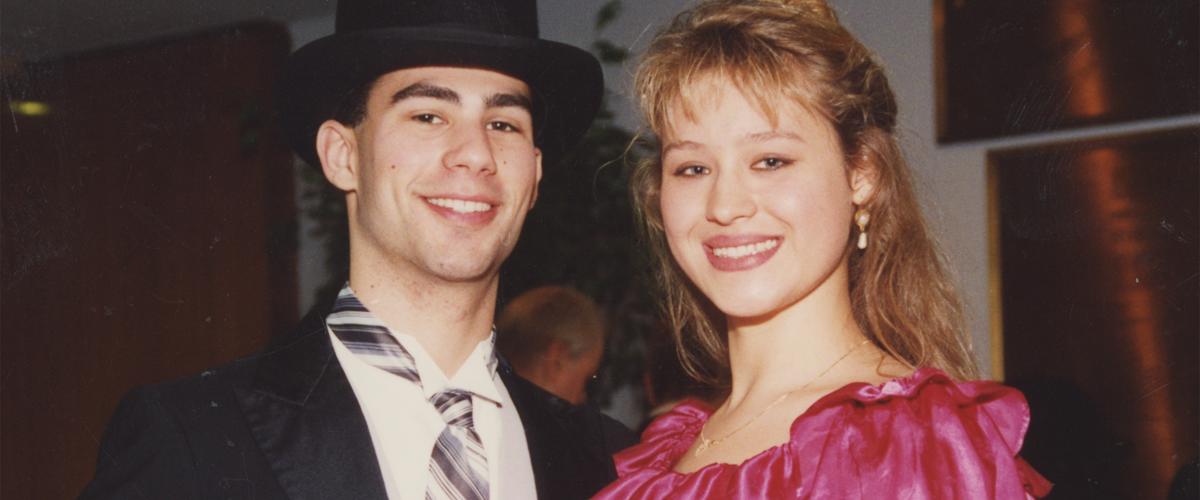 A couple poses for a photograph in the 1980s
