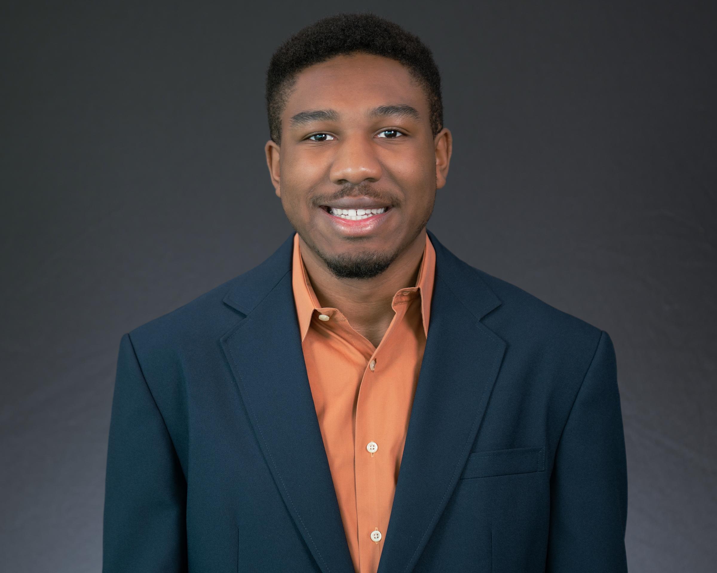 Headshot of Jonathan Martin wearing professional attire.