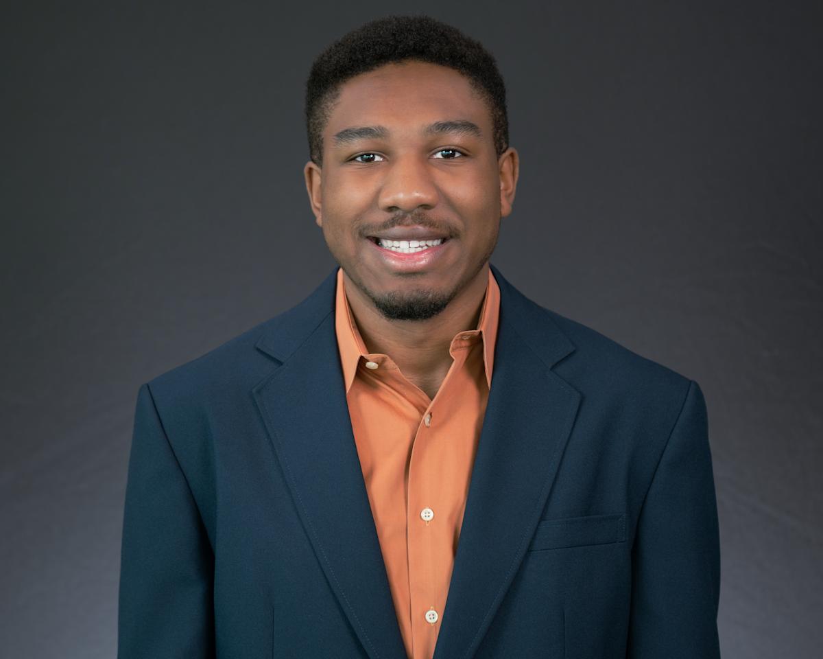 Headshot of Jonathan Martin wearing professional attire.