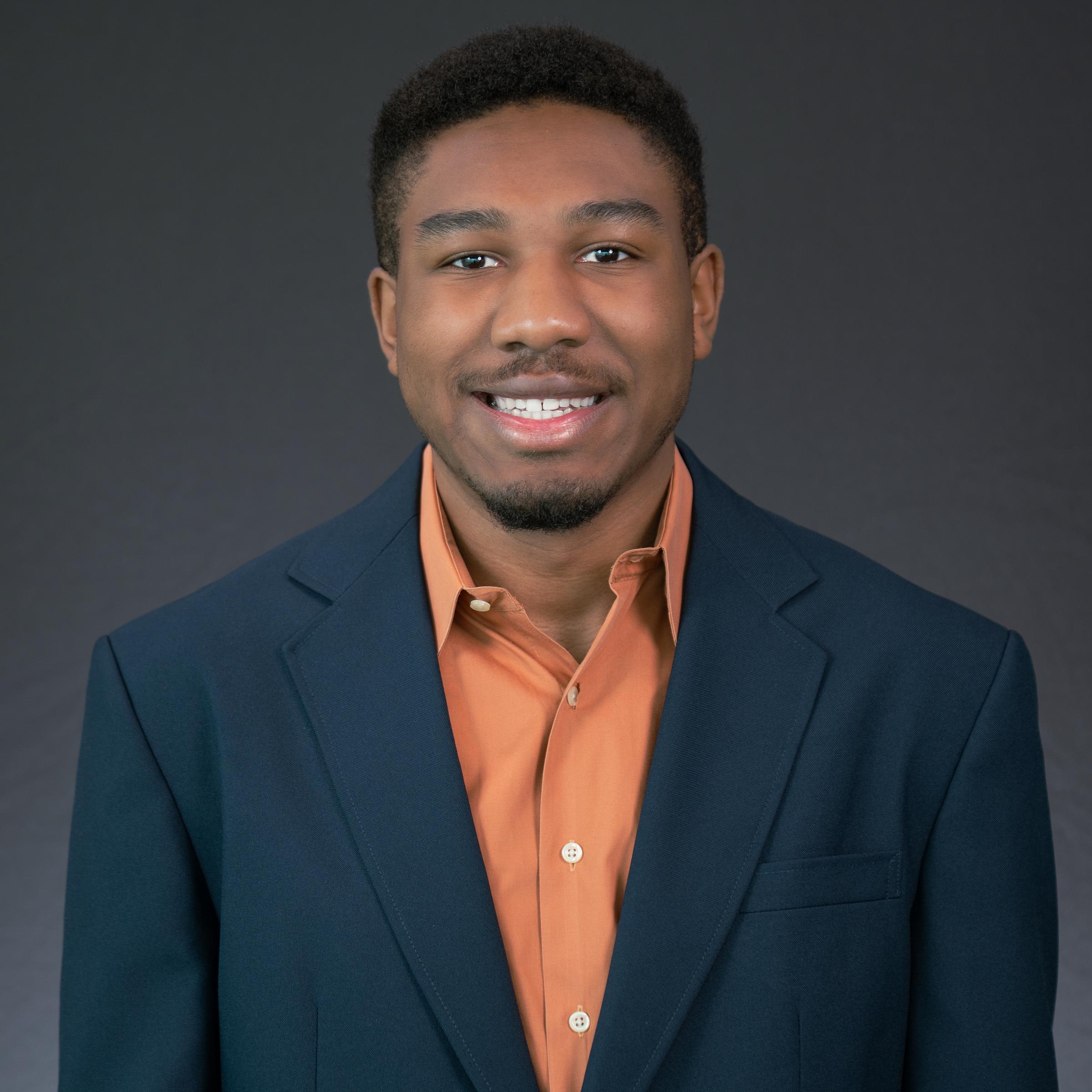 Headshot of Jonathan Martin wearing professional attire.