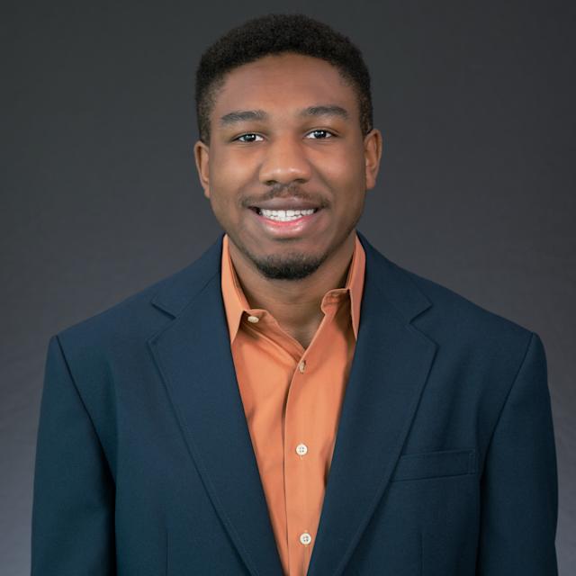 Headshot of Jonathan Martin wearing professional attire.
