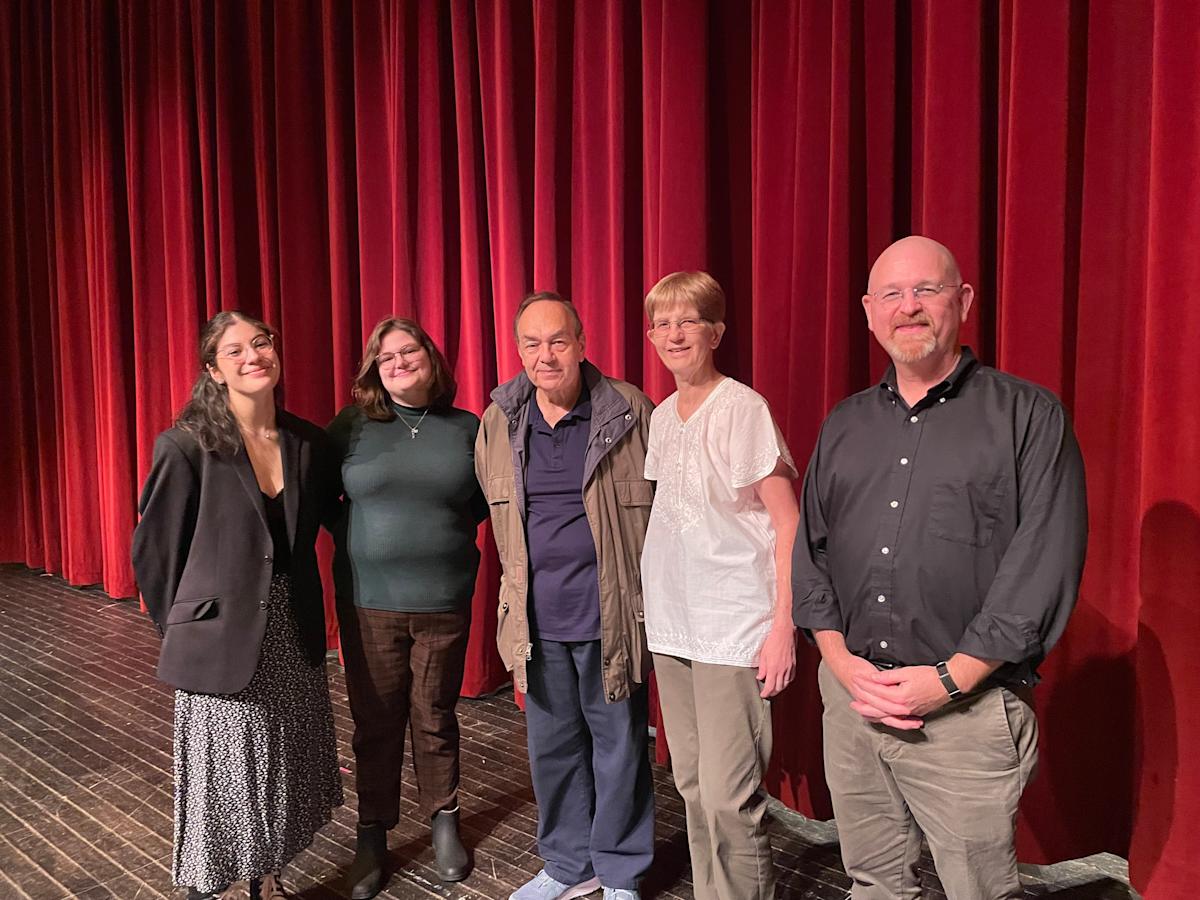 Barb and Jim Moraseski ’73 M.S. ’73 at the DeBaun Performing Arts Center with students and staff benefiting from their philanthropy