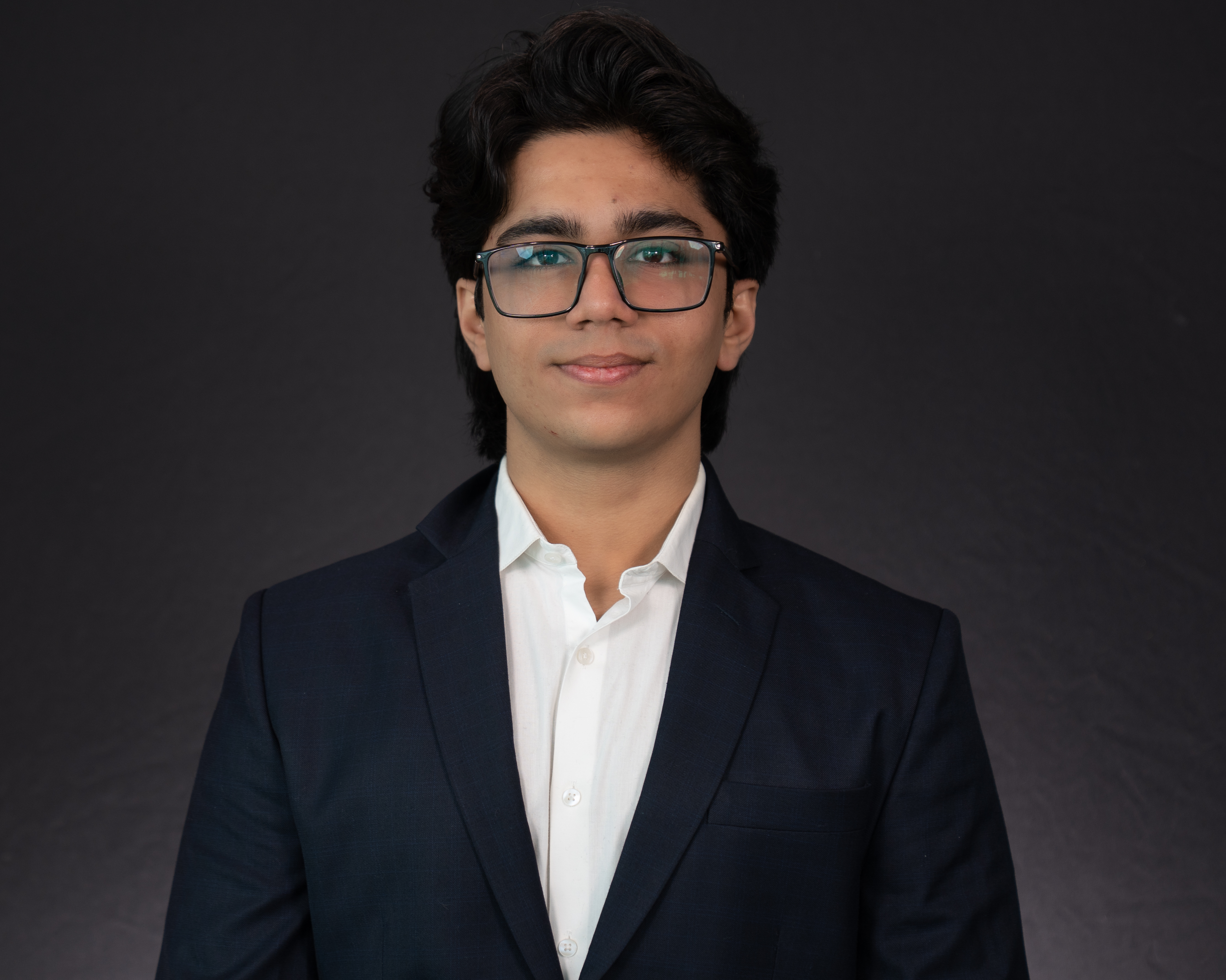 Headshot of Aditya Bhatia dressed in professional attire. 