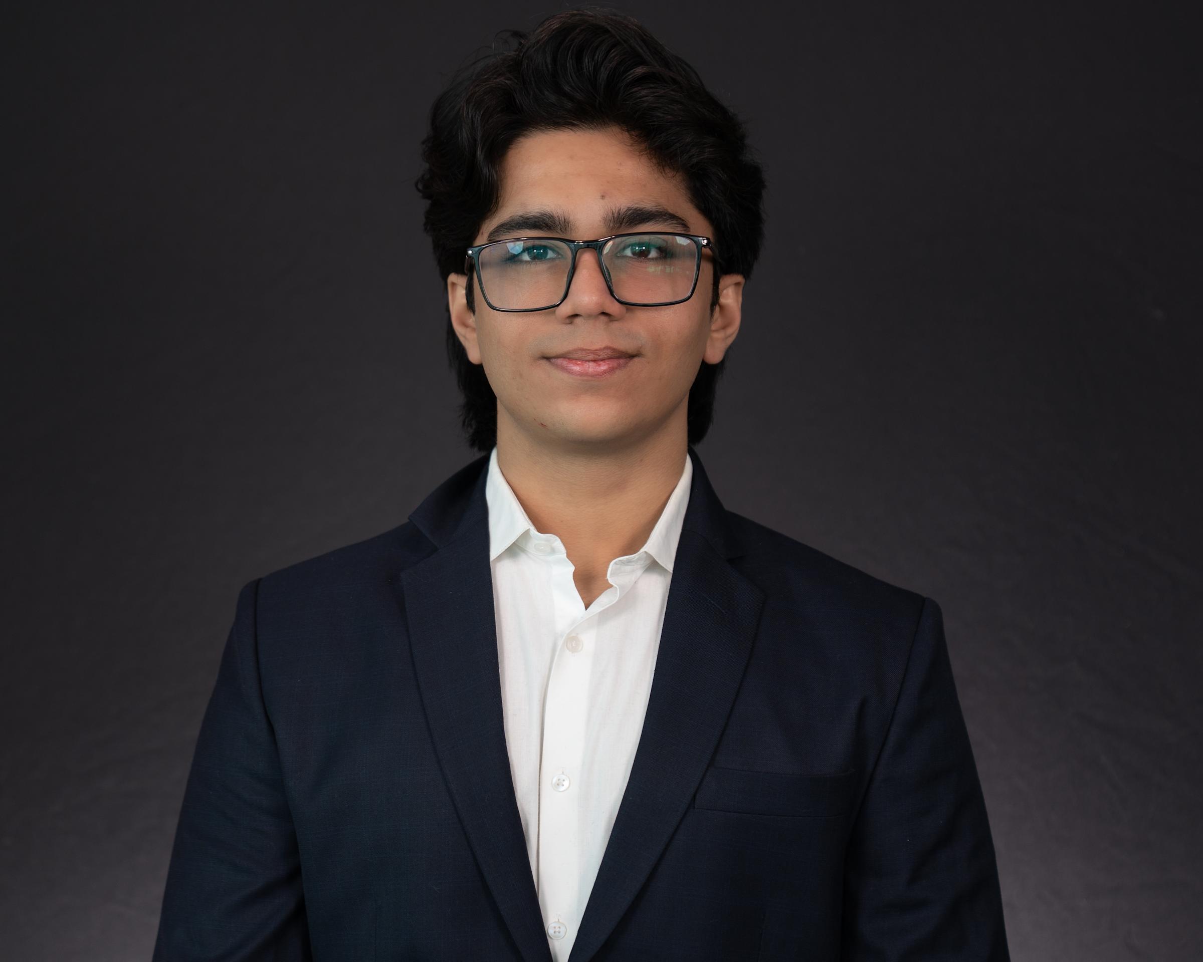 Headshot of Aditya Bhatia dressed in professional attire. 