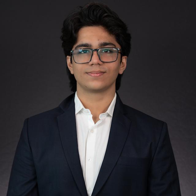 Headshot of Aditya Bhatia dressed in professional attire.