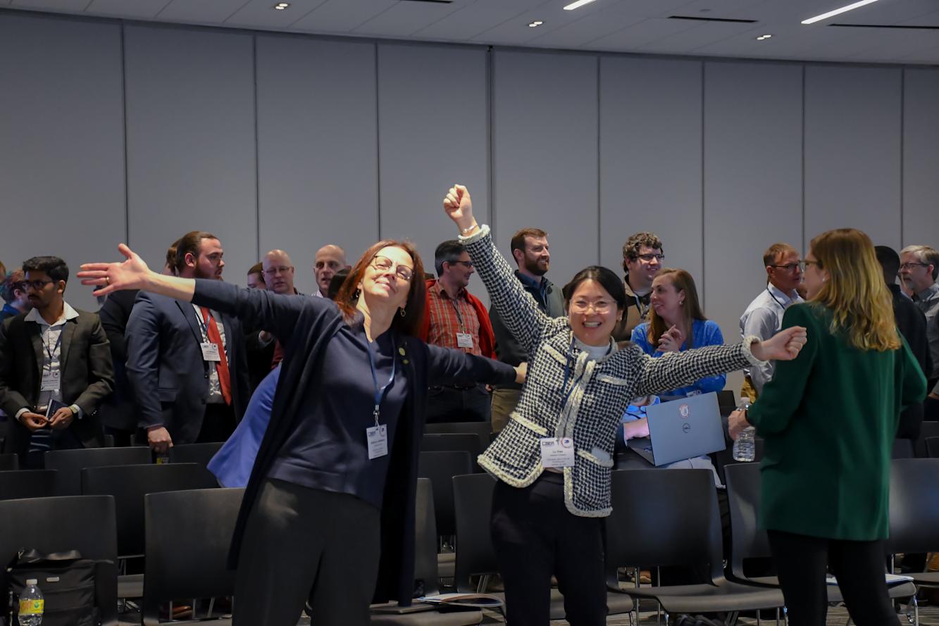 Two CSER 2023 guests posing and smiling