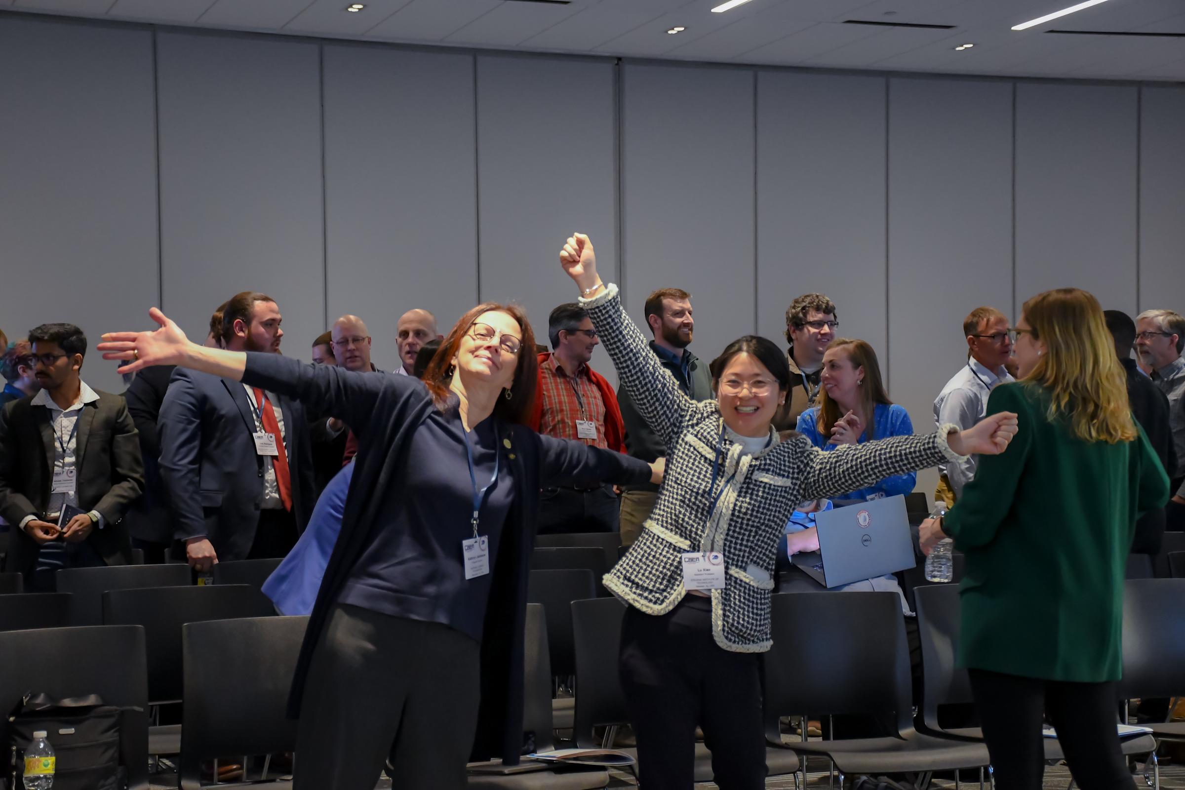 Two CSER 2023 guests posing and smiling